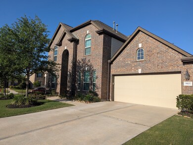 All brick front with 2 car garage and double drive
