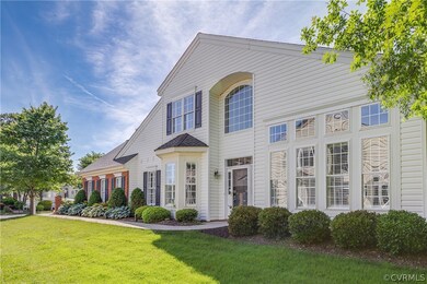 Beautifully landscaped entrance and front yard.