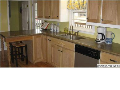 Large kitchen with stainless appliances and breakf