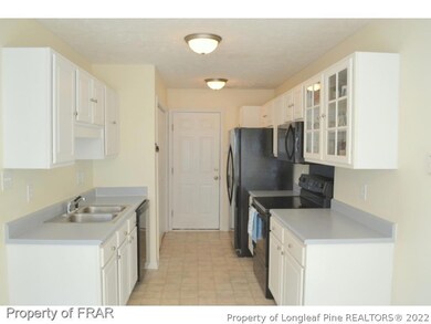 Kitchen With Refrigerator
