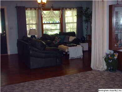 View from dining room into the family room. Loads 