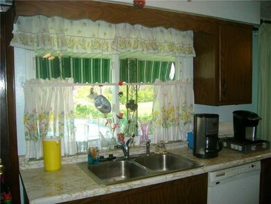 Kitchen. The kitchen with sink windows allows a gr