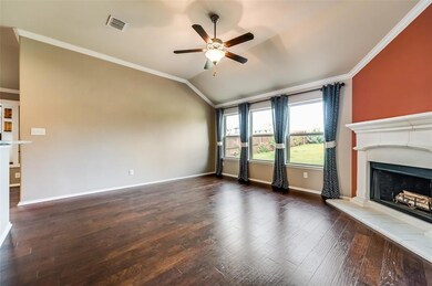 Family room with wood burning fire place.