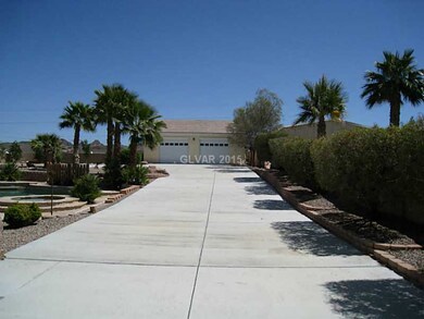 Parking Lot. South side RV parking (and more) looking towards the detached 3 car garage/shop.