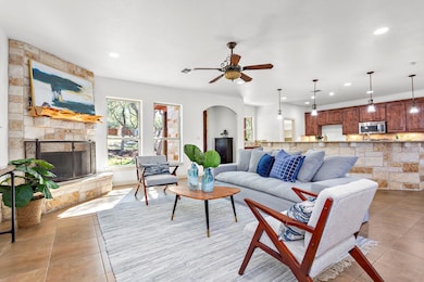Living room featuring light tile patterned floors