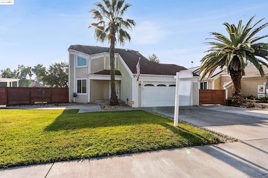 View of front of property featuring stucco siding, concrete driveway, a garage, and roof with shingles