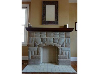 Exterior Front. Stone fireplace.