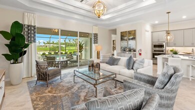 A comfortable gathering space for hosting movie nights or holiday parties, this living room flows ou