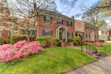 The mature landscaping adds color and charm.