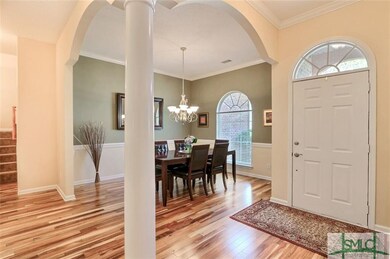Beautiful floors greet you in foyer.