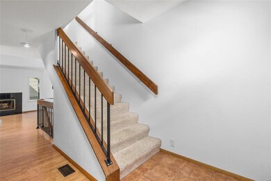 STAIRCASE TO UPPER LEVEL BEDROOMS