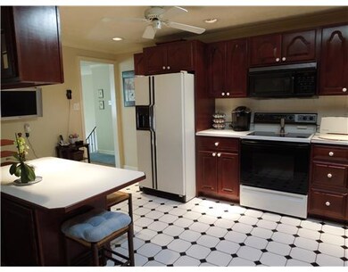 Kitchen. The newer appliances include double sink,