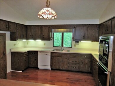 The kitchen features include fresh paint, new hard