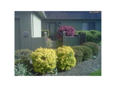 Wrought iron gated entrance to front door is elega