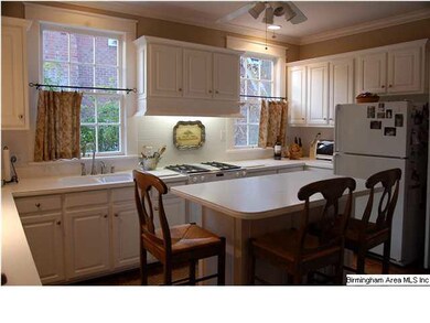 Kitchen with island and abundance of storage