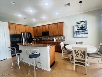 Kitchen featuring appliances with stainless steel