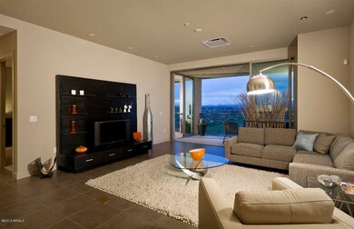 Living space opens to wall of glass
