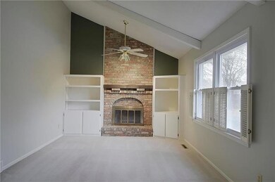 Great room with built in and wood burning fireplac