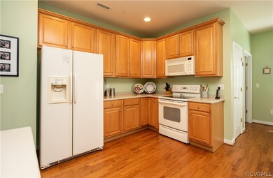 Kitchen with Recessed Lighting and Hardwood Floors