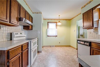 The large dine-in kitchen is right off the dining room