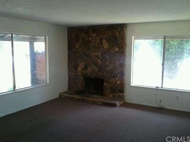 Living Room with Rock Fireplace
