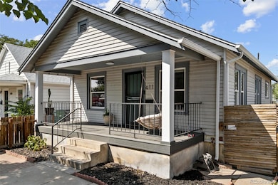 Xeriscaped front yard with covered porch