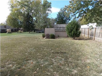 Storage Shed in Back Yard!