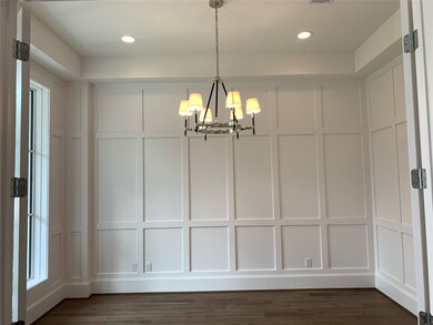 The study is located at the front of the house and