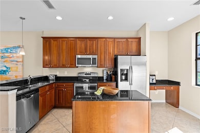 Kitchen with stainless steel appliances, 42in wood
