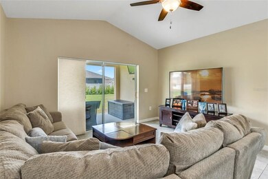 The FAMILY ROOM shows off the VAULTED CEILINGS and