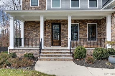 Property entrance featuring a porch
