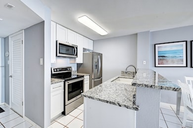 Stainless appliances and granite counters in the k