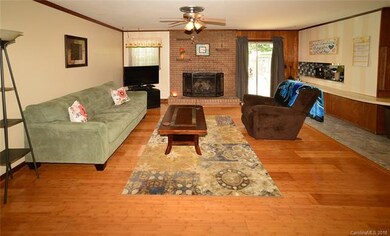 Family Room features hardwood flooring, masonry ga