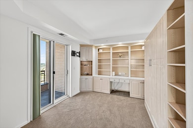 The office has French doors and its own private balcony. The custom built-in queen size Murphy bed easily makes this a 3rd bedroom.