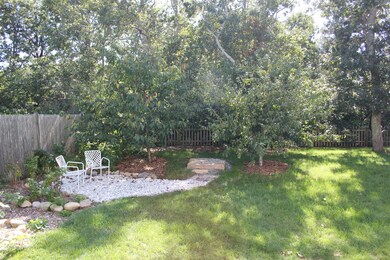 Side Yard with fruit trees and sitting area