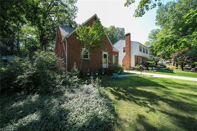 Lovely view of this brick bungalow with 4 bedrooms