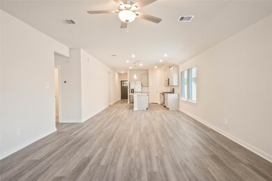 This home features a spacious open-concept living