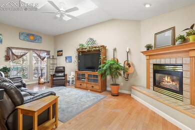 Beautiful wood floors and cozy gas fire.