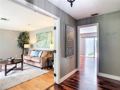 Foyer with Formal Living and Family Room View