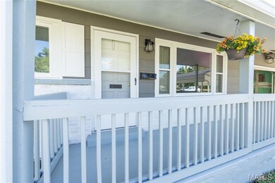 Entrance to property with a porch