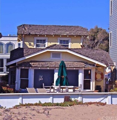 view of back of home from the sand