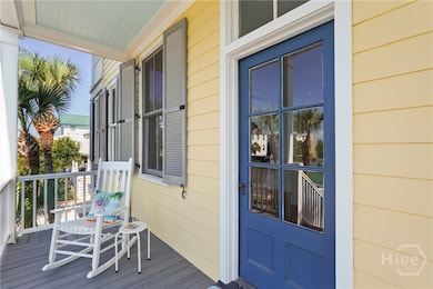 Relax on inviting front porch with rocking chair a