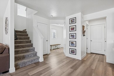 Entrance with door to garage