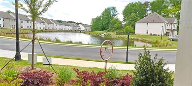 View of street featuring a water view, a residenti