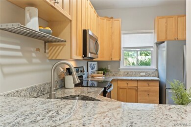 Kitchen with sink, light brown cabinetry, light st
