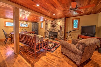 Open floor plan with rich hardwood floors, wood bu