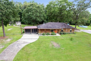 Front Exterior - home situated on .93 acre with at