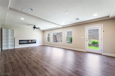Unfurnished living room featuring dark wood-style