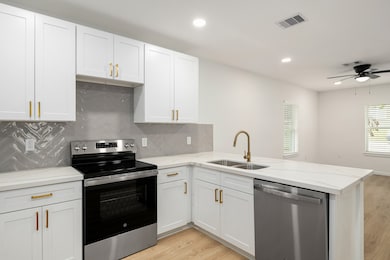 Additional kitchen highlights include a stunning t