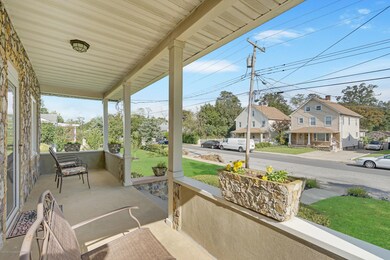 ANOTHER VIEW OF OPEN FRONT PORCH